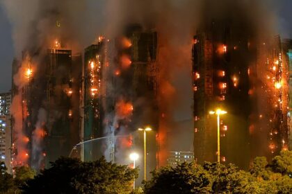 Thick smoke and flames rise from a major fire engulfing several high-rises at Wang Fuk Court in Hong Kong’s Tai Po district on 26 November 2025.