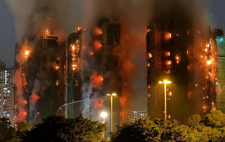 Thick smoke and flames rise from a major fire engulfing several high-rises at Wang Fuk Court in Hong Kong’s Tai Po district on 26 November 2025.